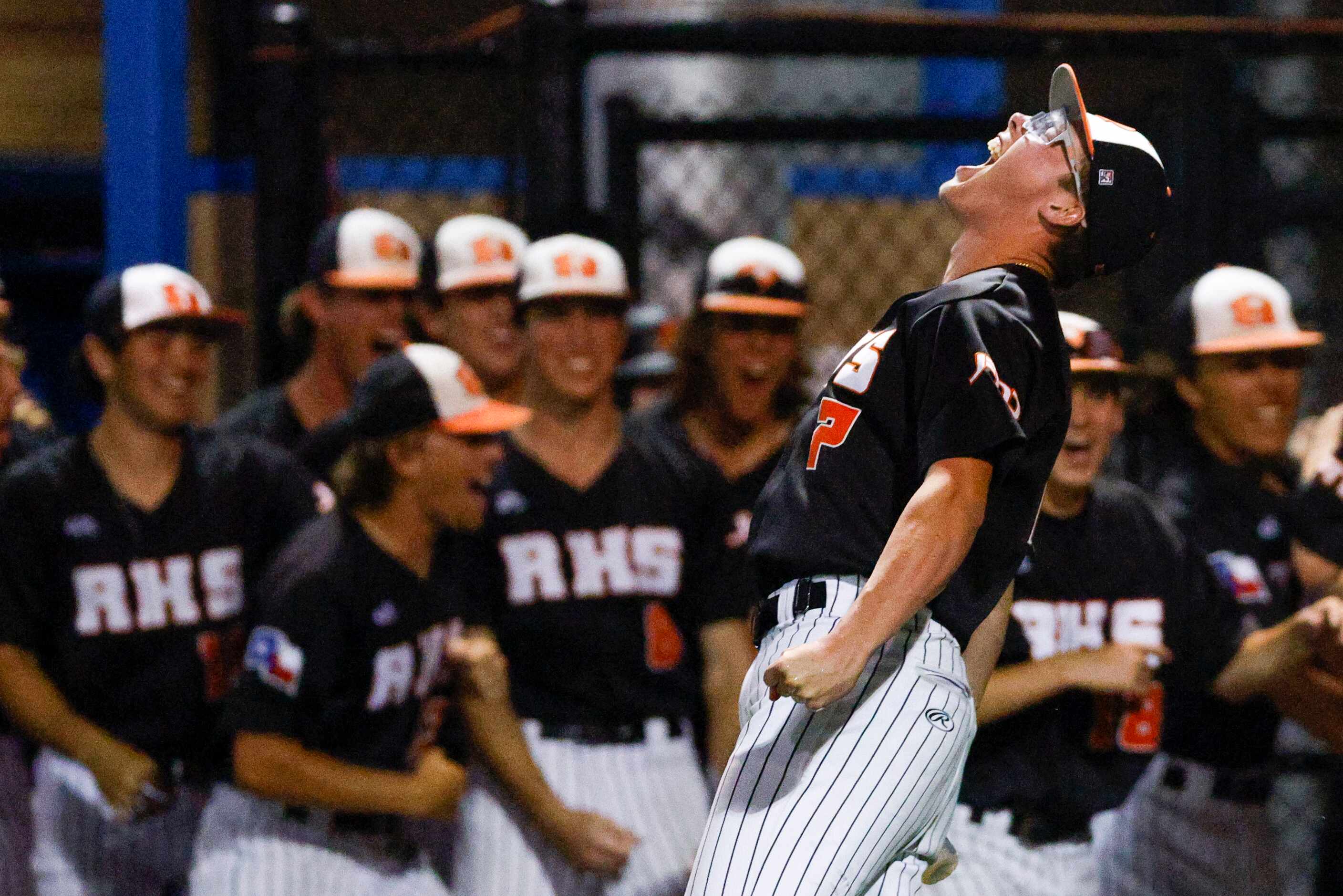Rockwall’s Holden Blackwell (7) lets out a celebratory scream after the team scored three...