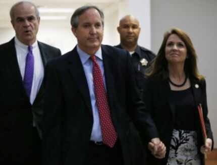  Texas Attorney General Ken Paxton and wife Angela entered the Merrill Hartman Courtroom in...