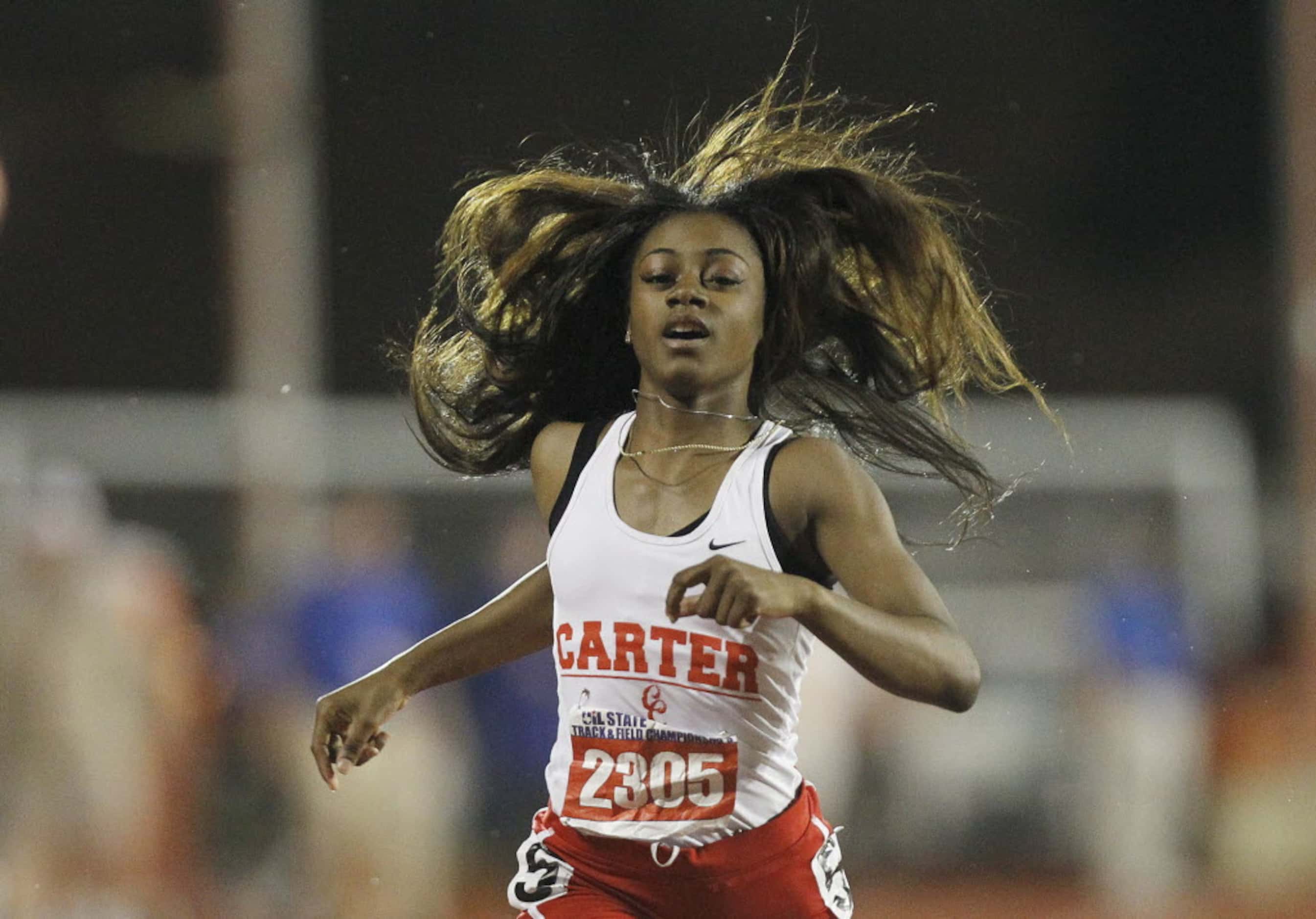 Dallas Carter's Sha'Carri Richardson competes in the class 4A girls 200-meter dash during...