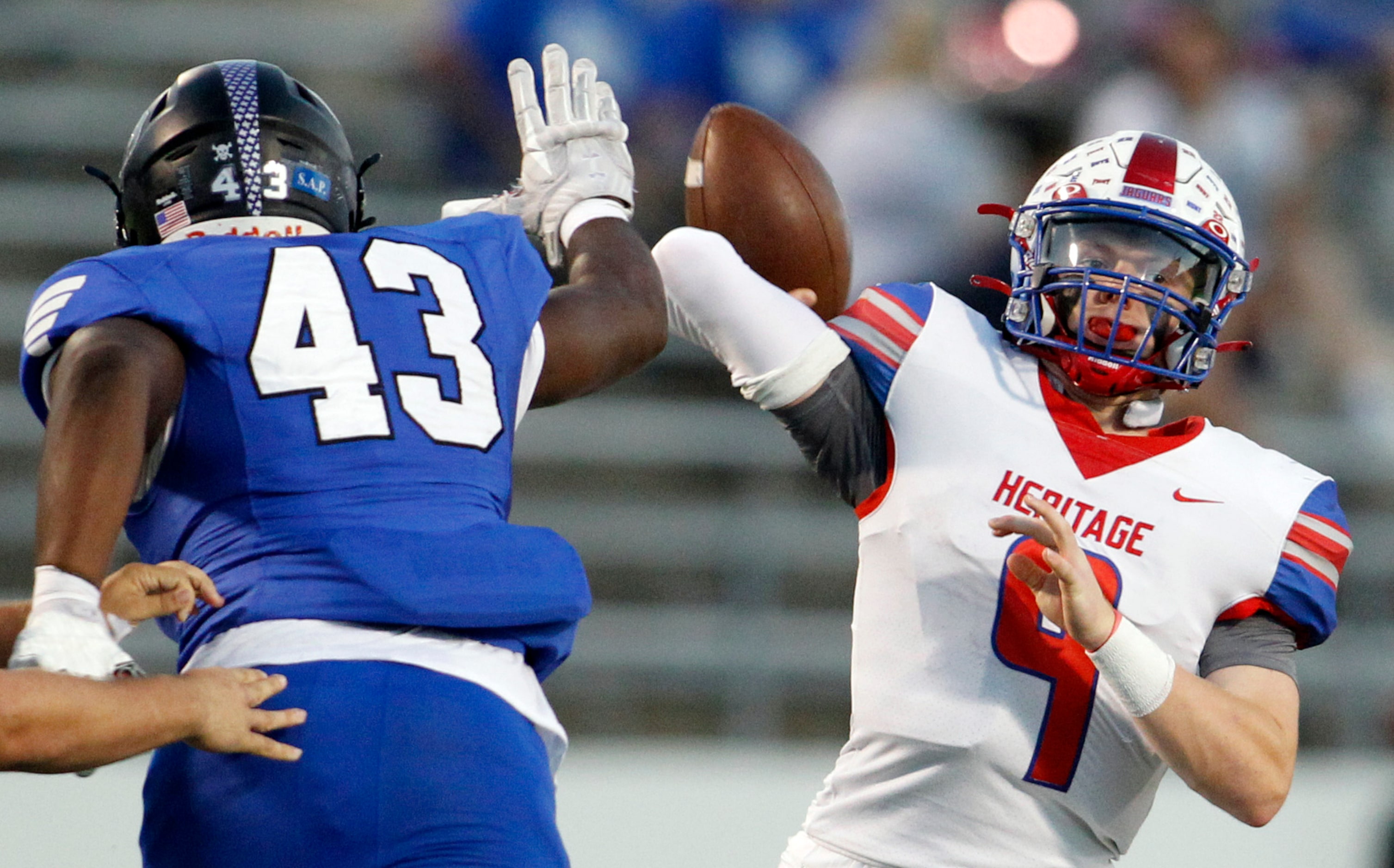 Midlothian Heritage quarterback Carter Rutenbar (9) launches a pass downfield as Mansfield...