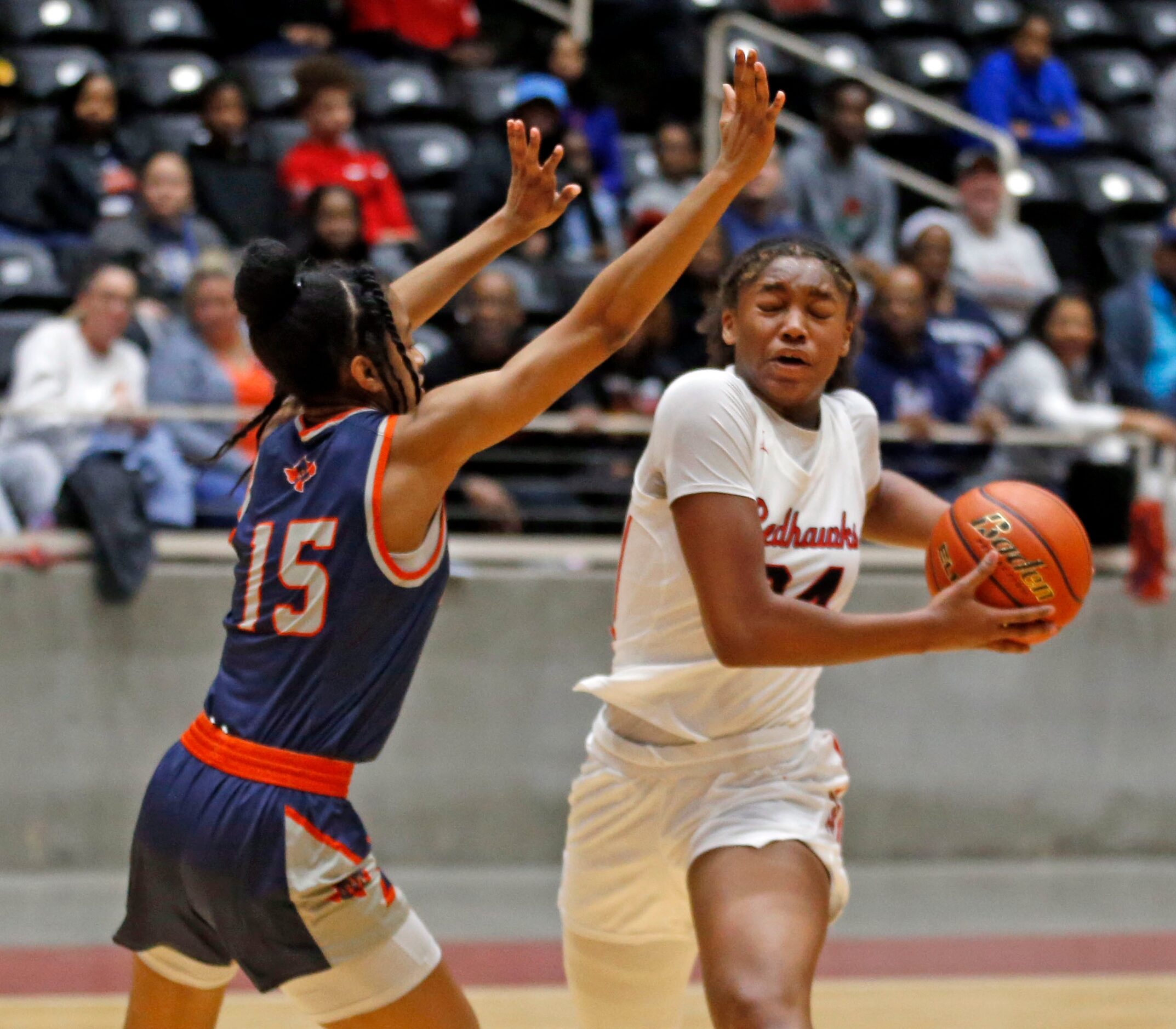 Frisco Liberty High’s G Jacy Abii (24) tries to drive past  McKinney North high's G Alyssia...