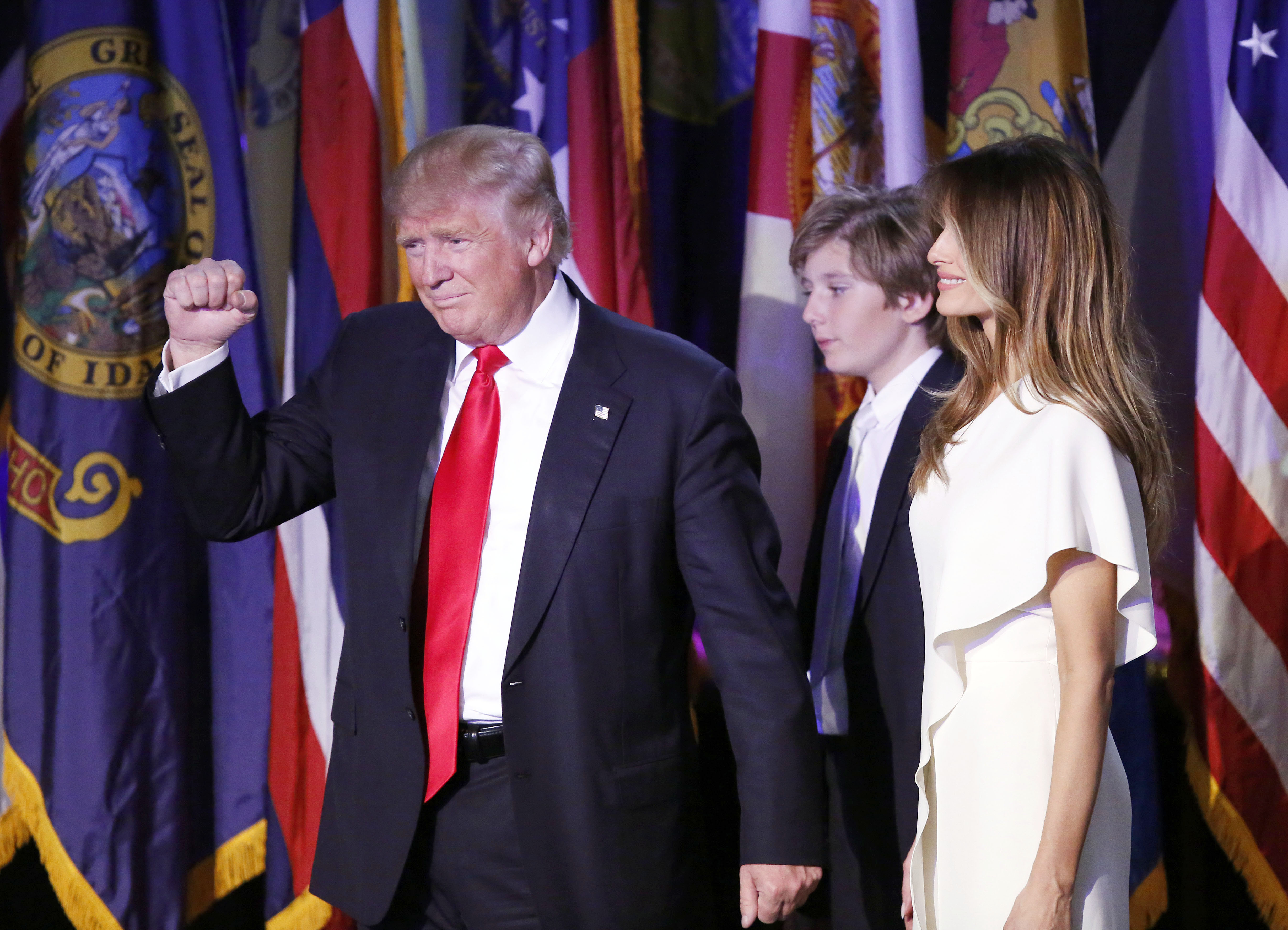 Donald Trump, onstage with his wife, Melania, and son Baron, acknowledged a crowd of...