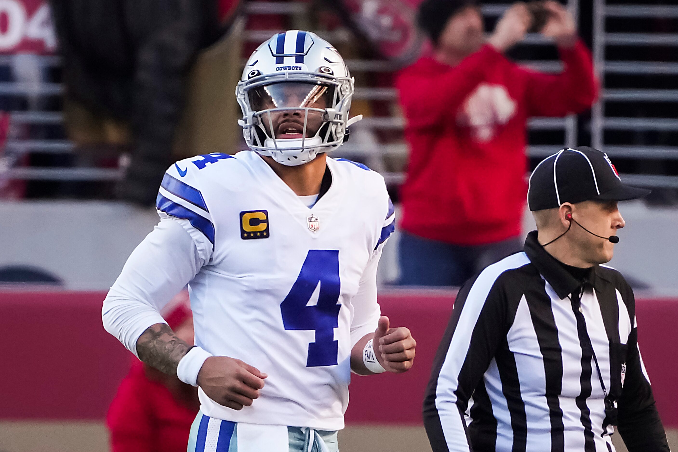 Dallas Cowboys quarterback Dak Prescott (4) leaves the field after having a pass intercepted...