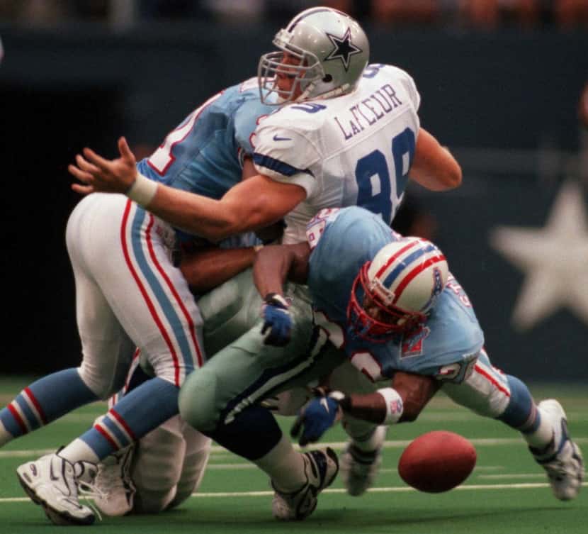 8/22/97--Dallas tight end David LaFleur (89) fumbles  after catching a Troy Aikman pass in...