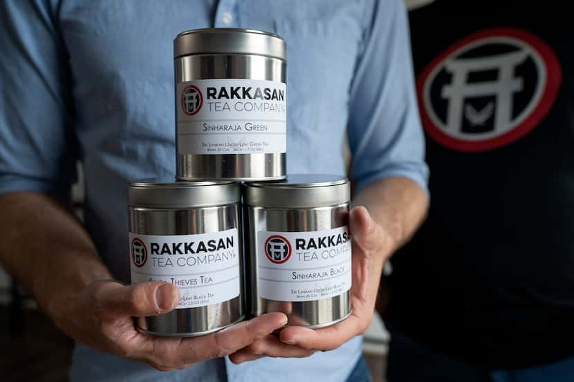Brandon Friedman, CEO of Rakkasan Tea, holds canisters of loose-leaf tea at the company’s...