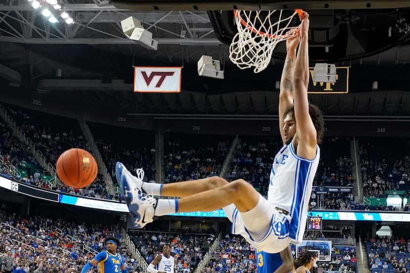 FILE - Duke center Dereck Lively II dunks against Pittsburgh during the first half of an...