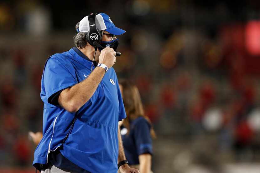 Offensive coordinator Jeff Grimes of the BYU Cougars reacts in the first half against the...