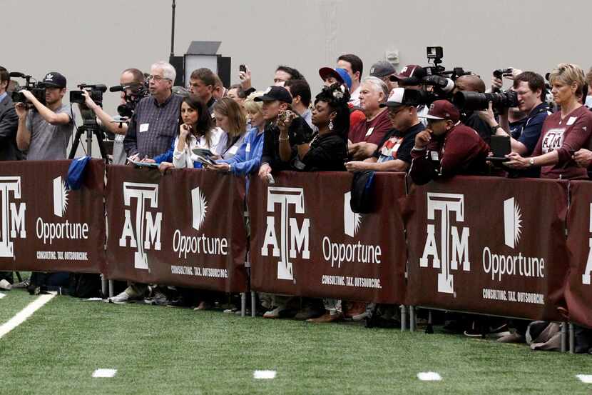 The media lined up as Former Texas A&M QB Johnny Manziel worked out for NFL teams on March...