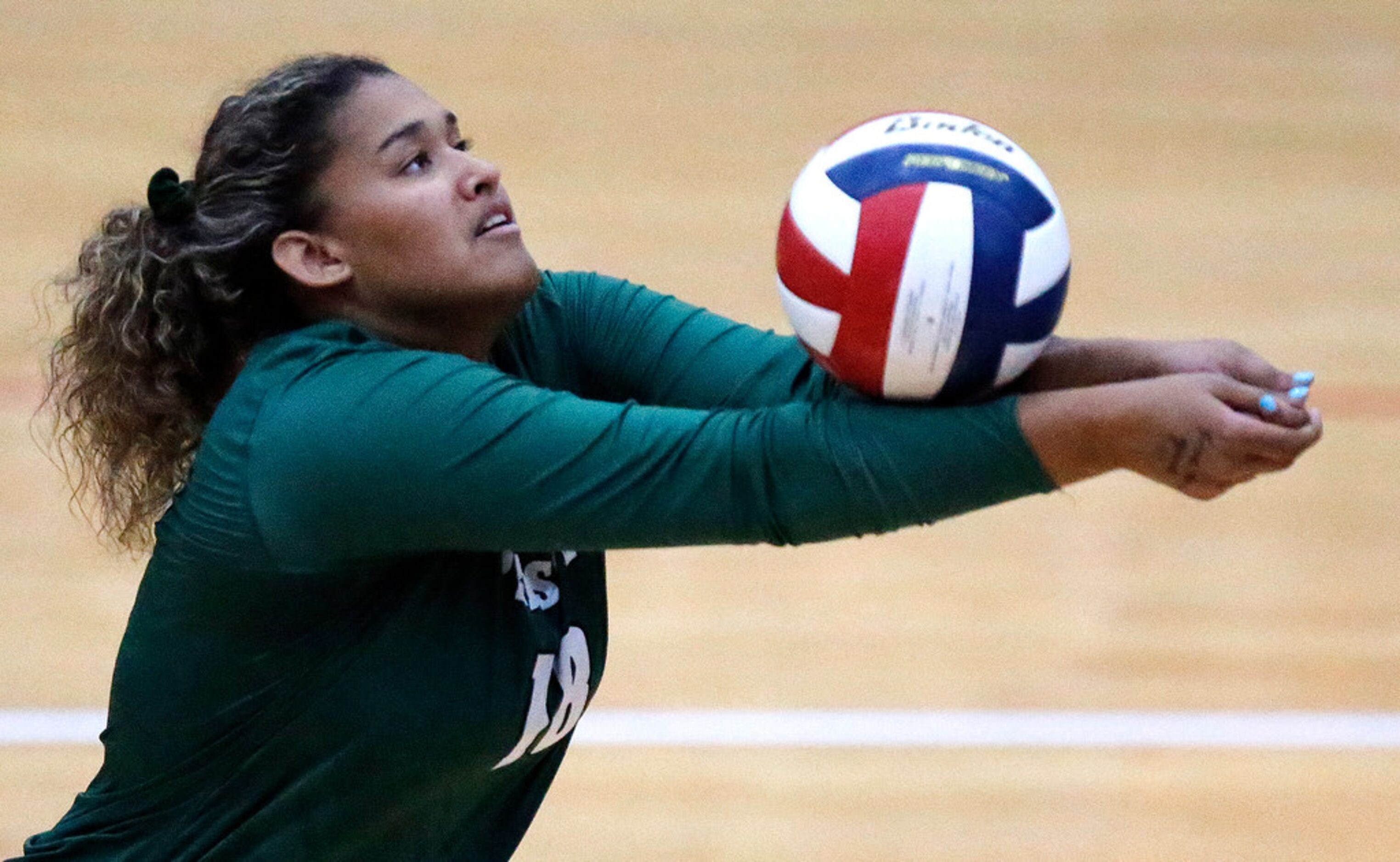 Prosper High School setter Mackenzie Jefferson (18) passes the ball during game two as Allen...