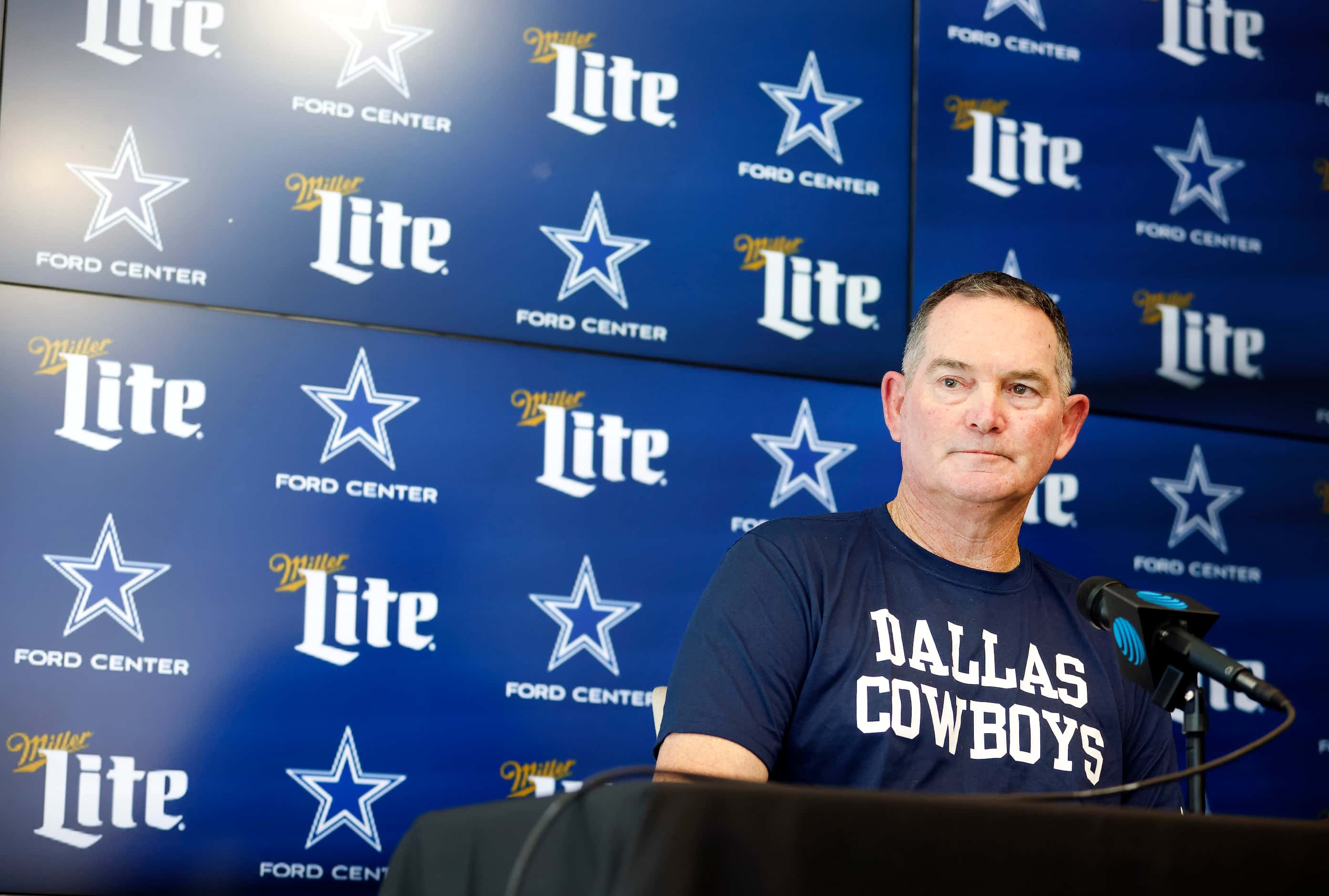 New Dallas Cowboys defensive coordinator Mike Zimmer listens to a question from the media...