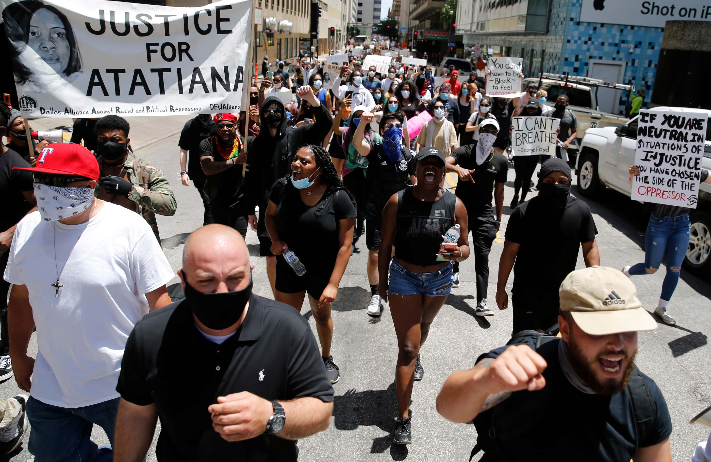 Protesters march against police brutality in downtown Dallas, on Saturday, May 30, 2020....