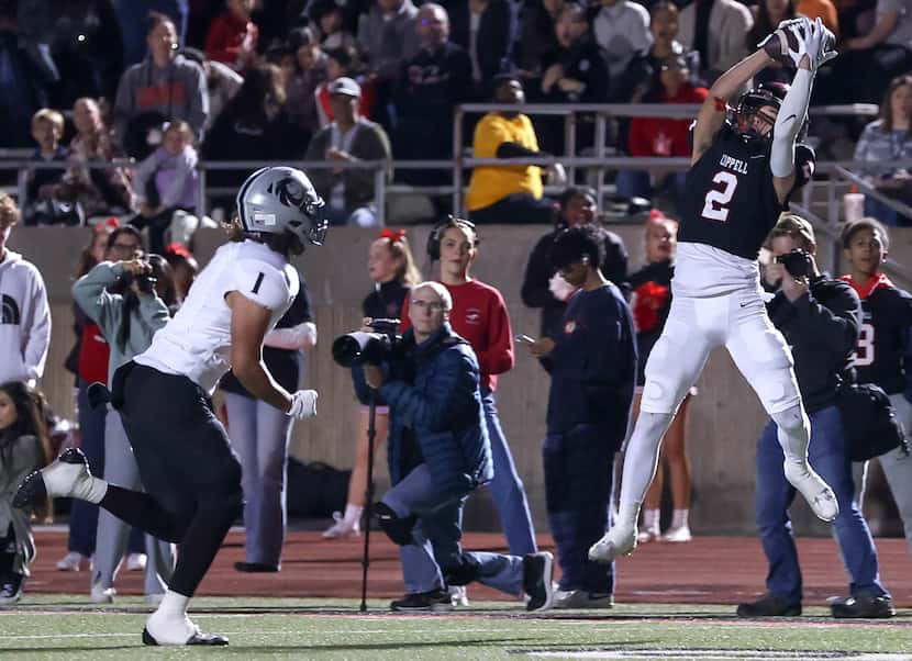 Coppell wide receiver Luca Grosoli (2) comes up with a reception against Denton Guyer...