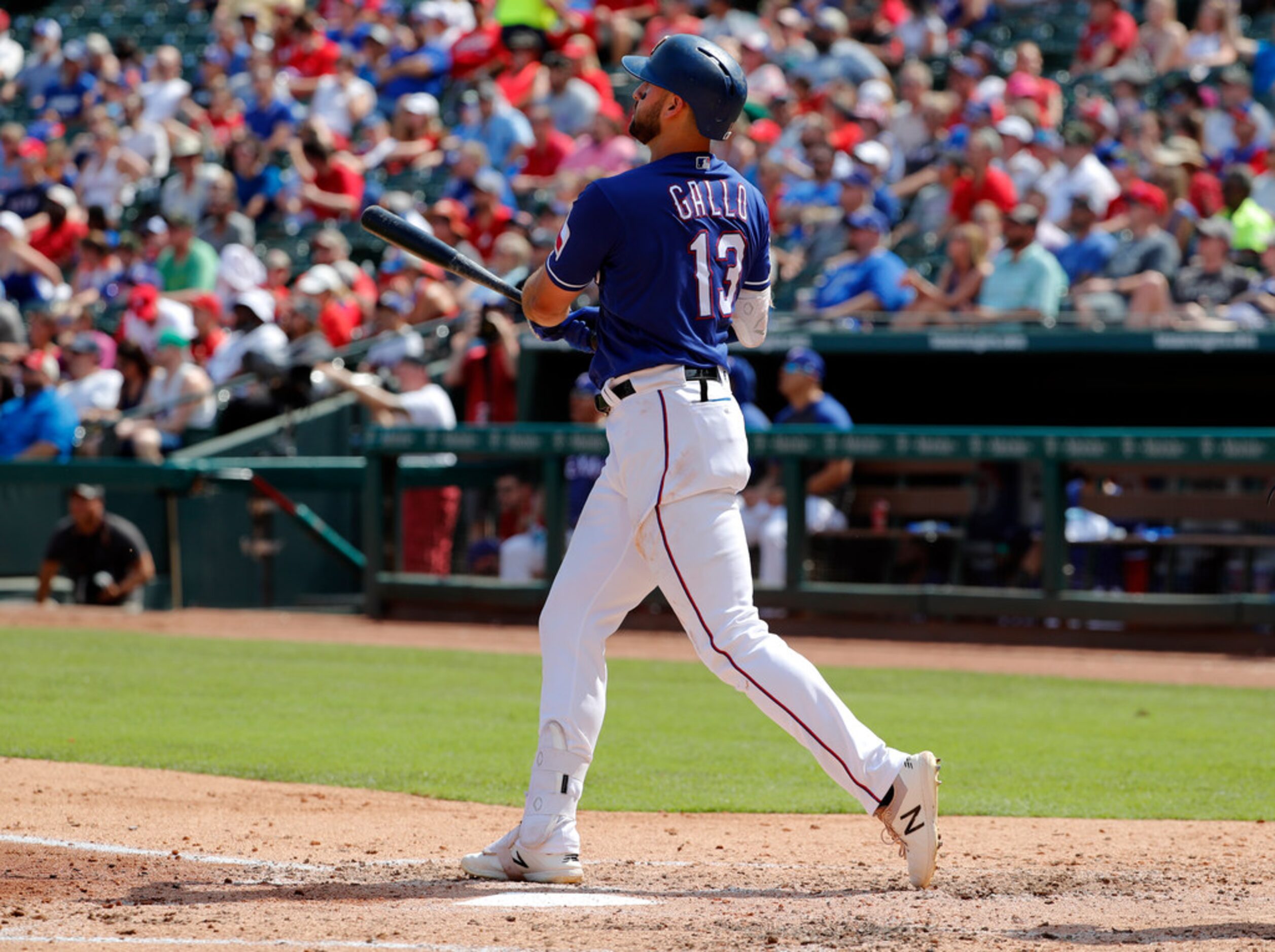 Texas Rangers' Joey Gallo connects for a two-run home run on a pitch from Kansas City...