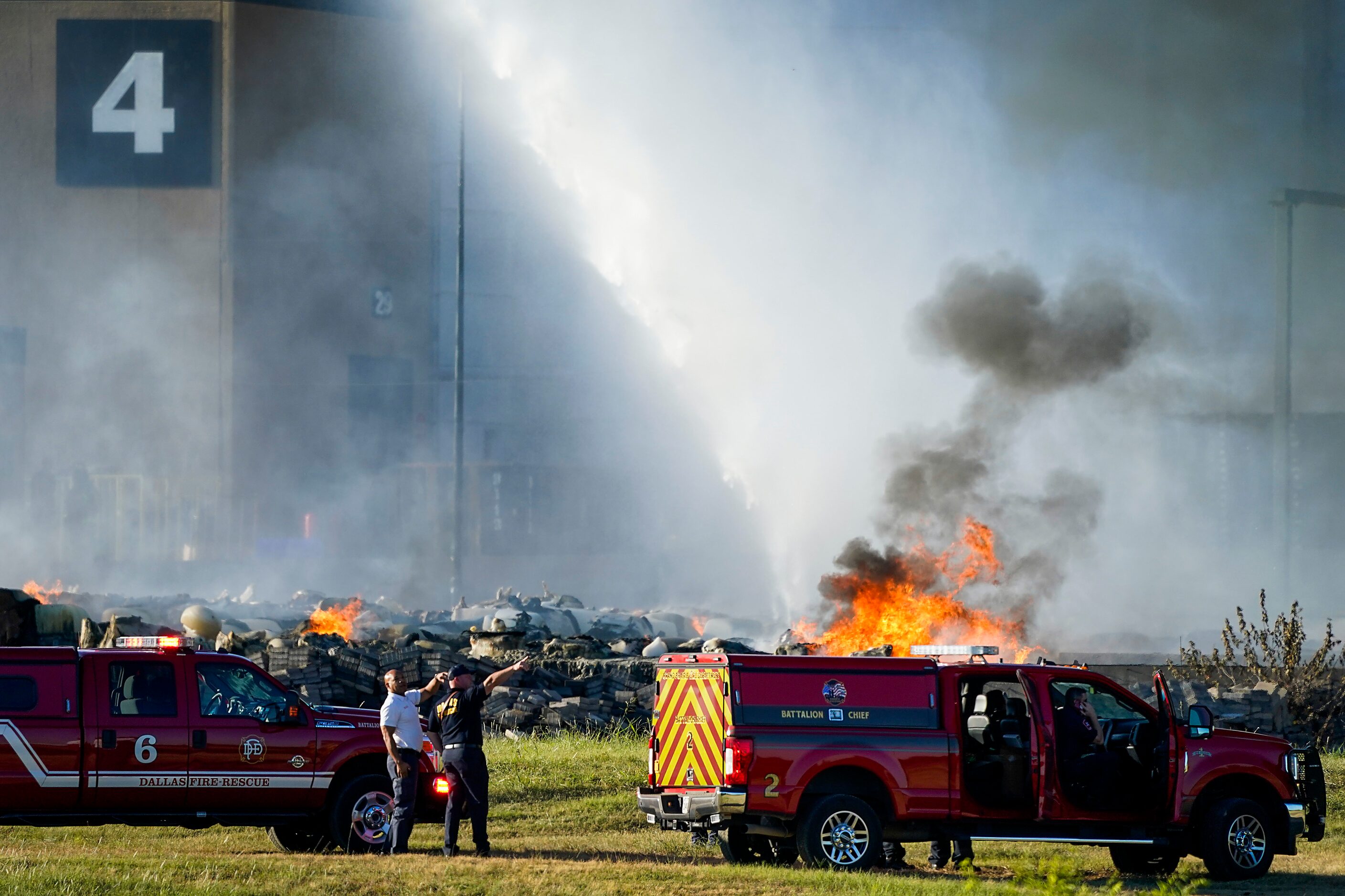 Fire crews battle a massive blaze in an industrial area of Grand Prairie on Wednesday...