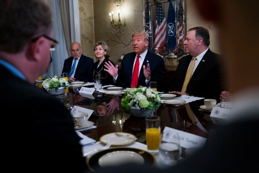 President Donald Trump speaks during a breakfast meeting with NATO Secretary-General Jens...