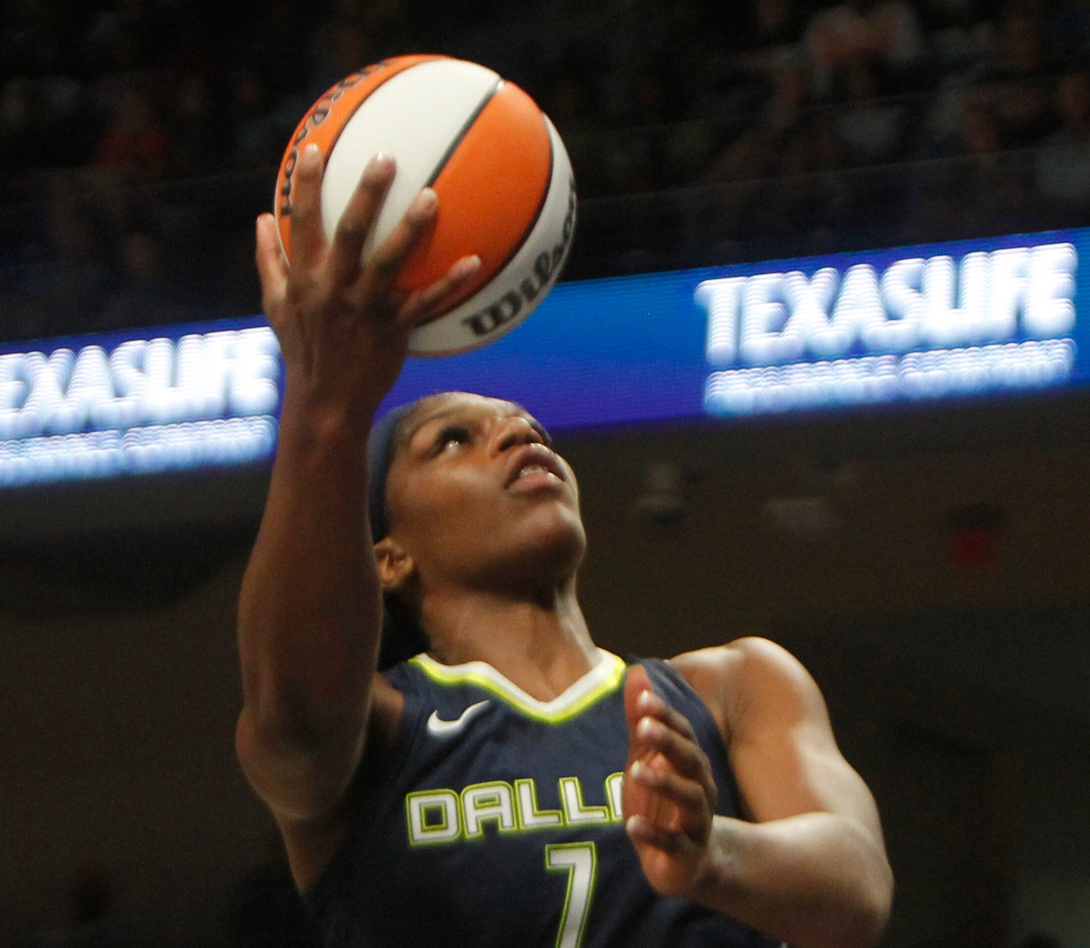 Dallas Wings center Teaira McCowan (7) goes up for two of her first half points against the...