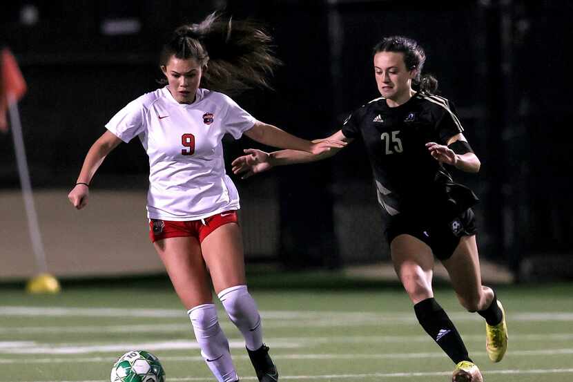 Argyle's Gracie Lee (9) tries to dribble the ball past Birdville Tatum McCasland (25) during...
