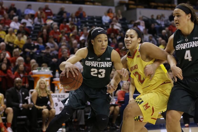 Michigan State forward Aerial Powers (23) drives on Maryland center Brionna Jones (42) in...