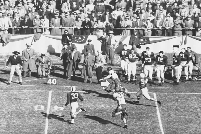 ORG XMIT: DNM1 FILE--Rice's Dick Maegle, white jersey, is tackled by  Alabama's Tommy Lewis,...