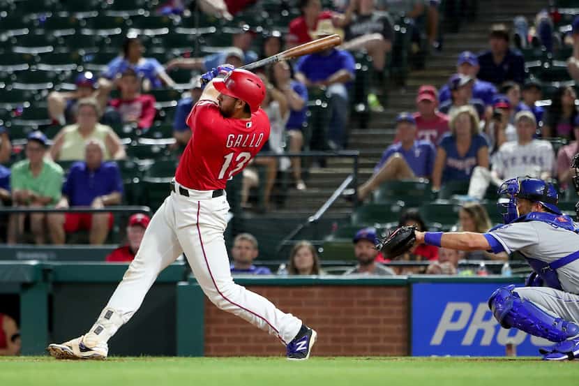 ARLINGTON, TX - APRIL 20:  Joey Gallo #13 of the Texas Rangers hits a double against the...