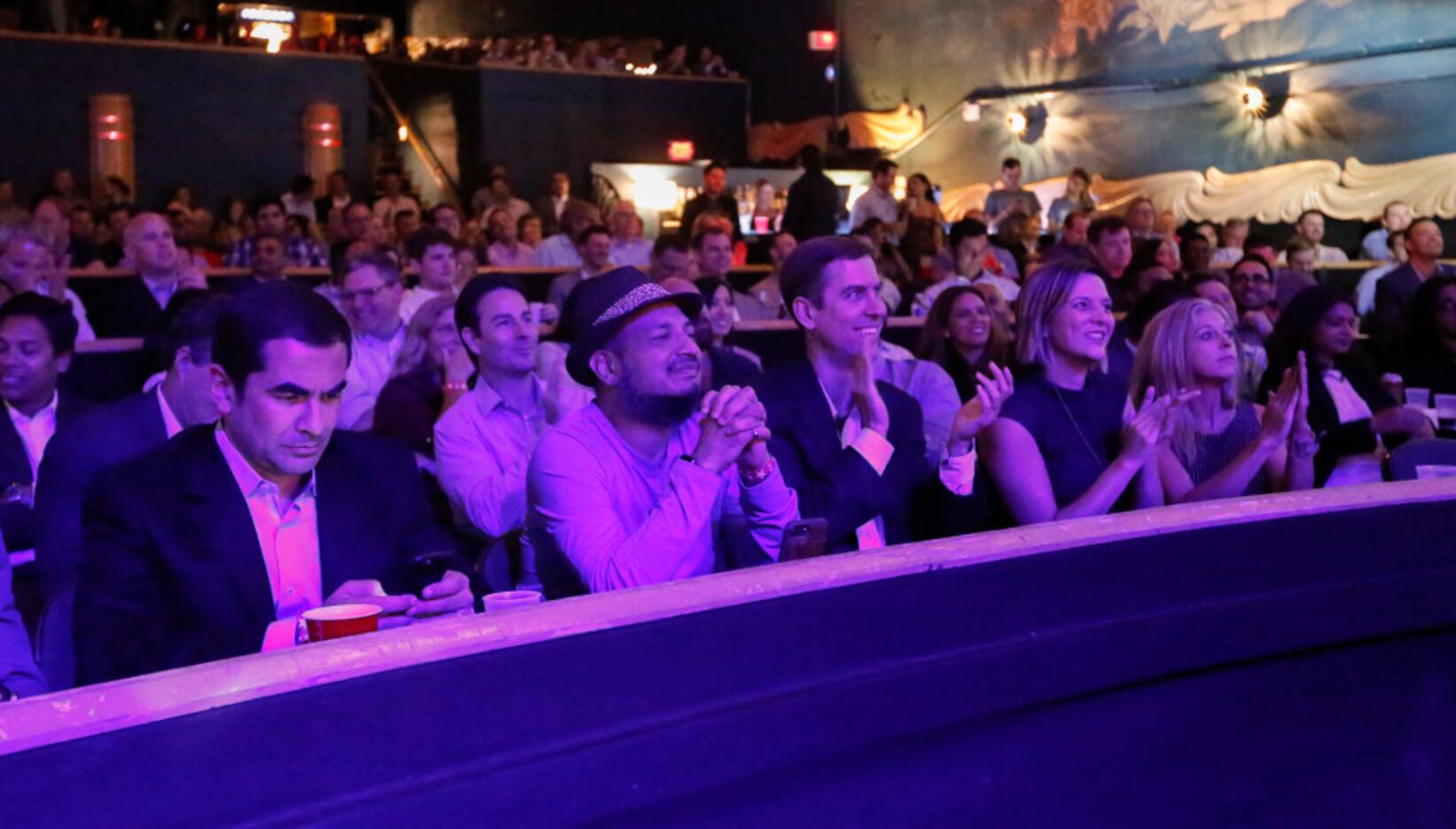 The audience reacts to a rebuttal during one of the "fights" at Digital Fight Club held at...