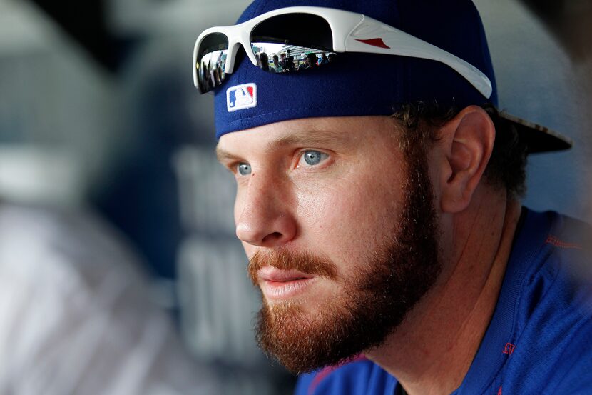 Texas Rangers'  Josh Hamilton looks out on the field as he talks to the media prior to the...