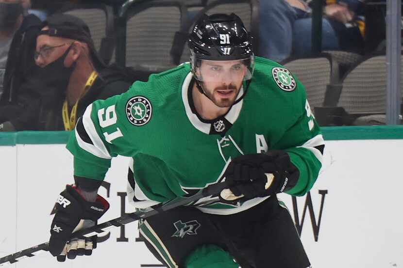 Dallas Stars center Tyler Seguin (91) chases after the puck during the first period of a...