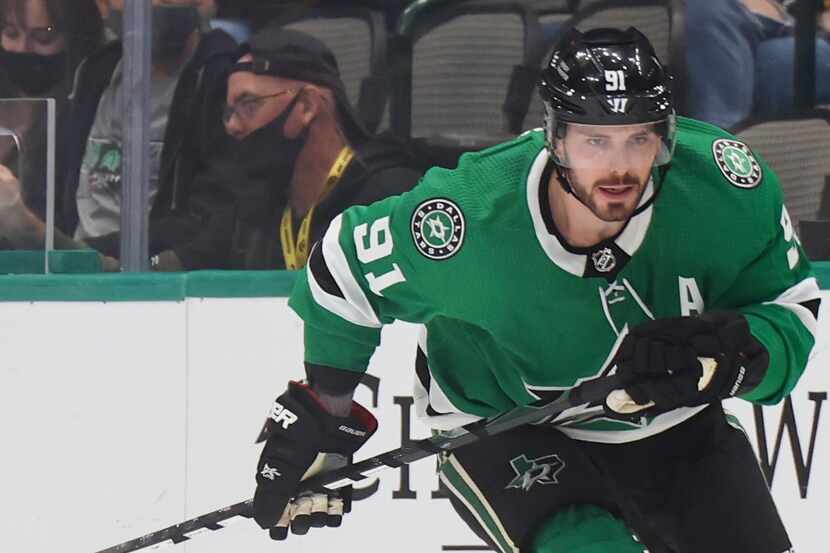 Dallas Stars center Tyler Seguin (91) chases after the puck during the first period of a...