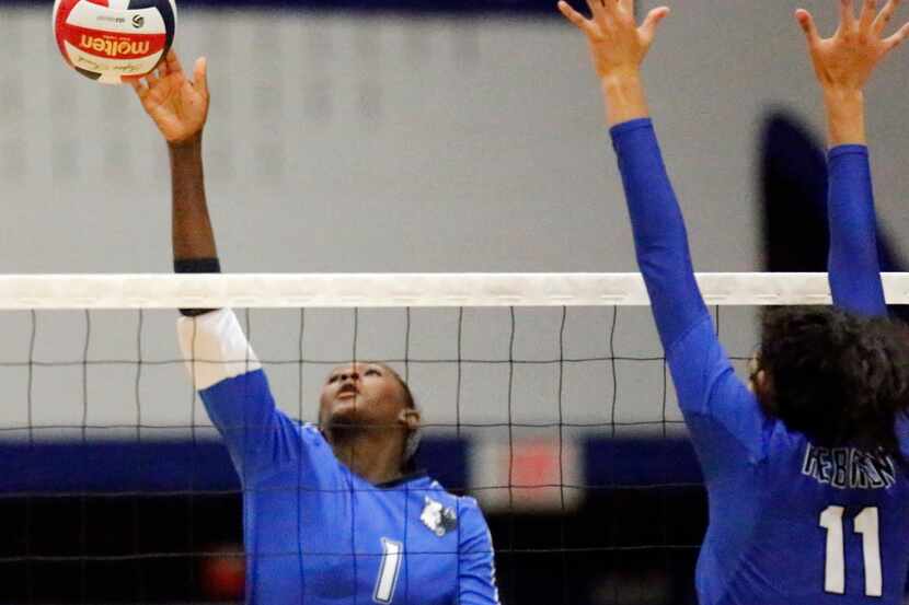 Plano West outside hitter Iman Ndiaye (1) and her teammates, coming off a pair of tournament...