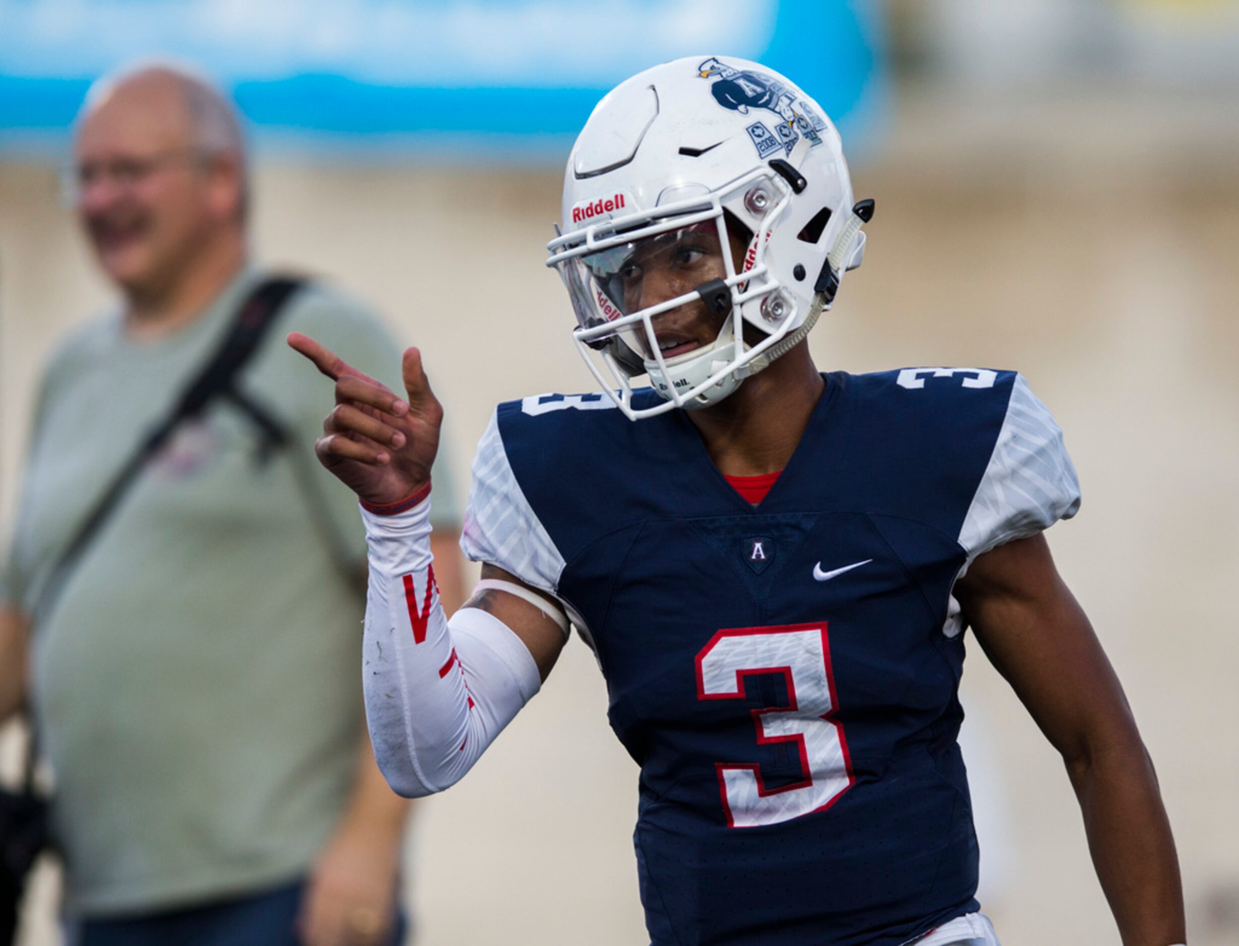 Allen quarterback Raylen Sharpe (3) celebrates after running the ball to the end zone for a...