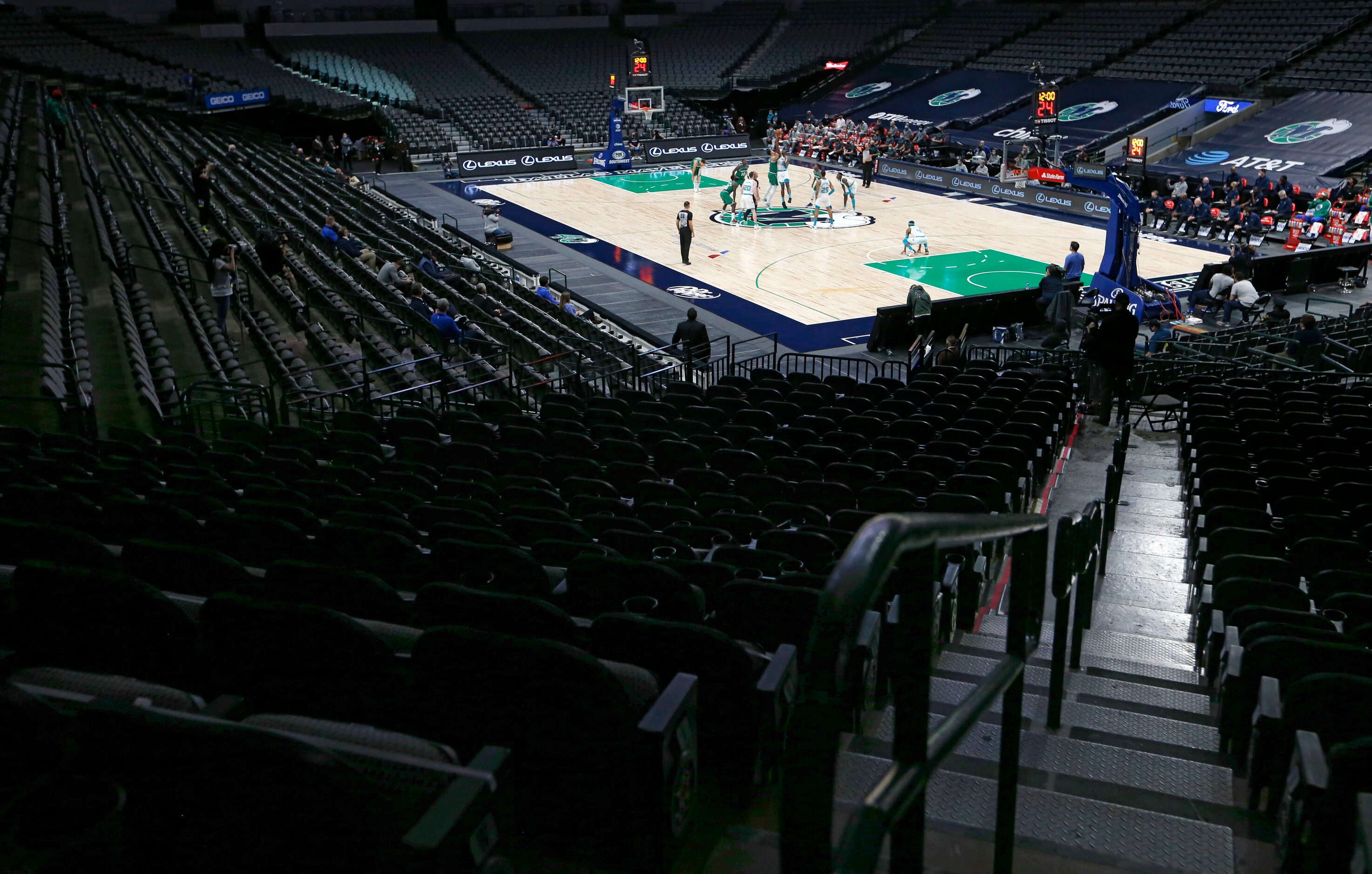 The Dallas Mavericks and Charlotte Hornets tip off as they play in the first quarter of play...