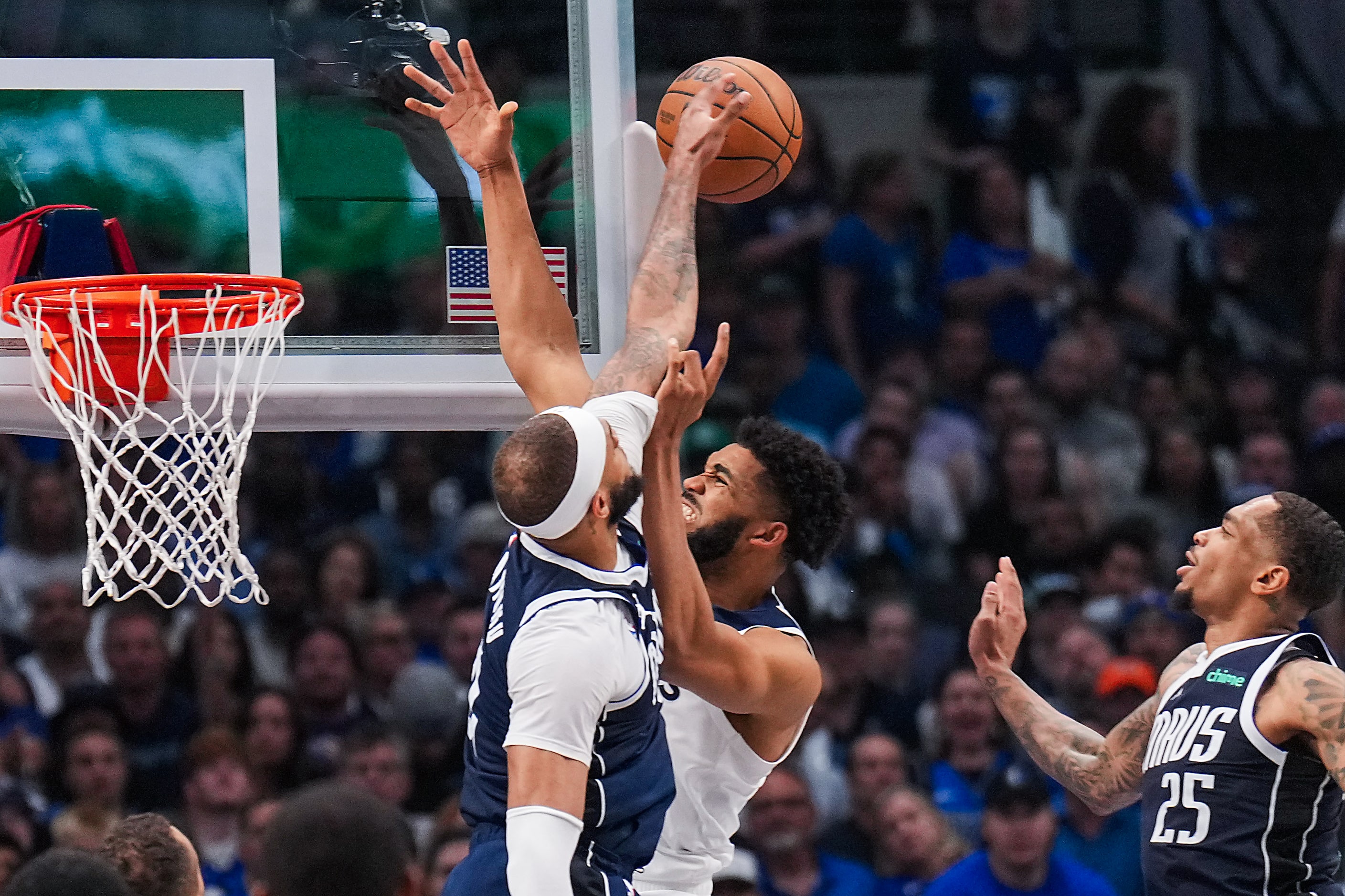 Dallas Mavericks center Daniel Gafford (21) blocks a shot by Minnesota Timberwolves center...