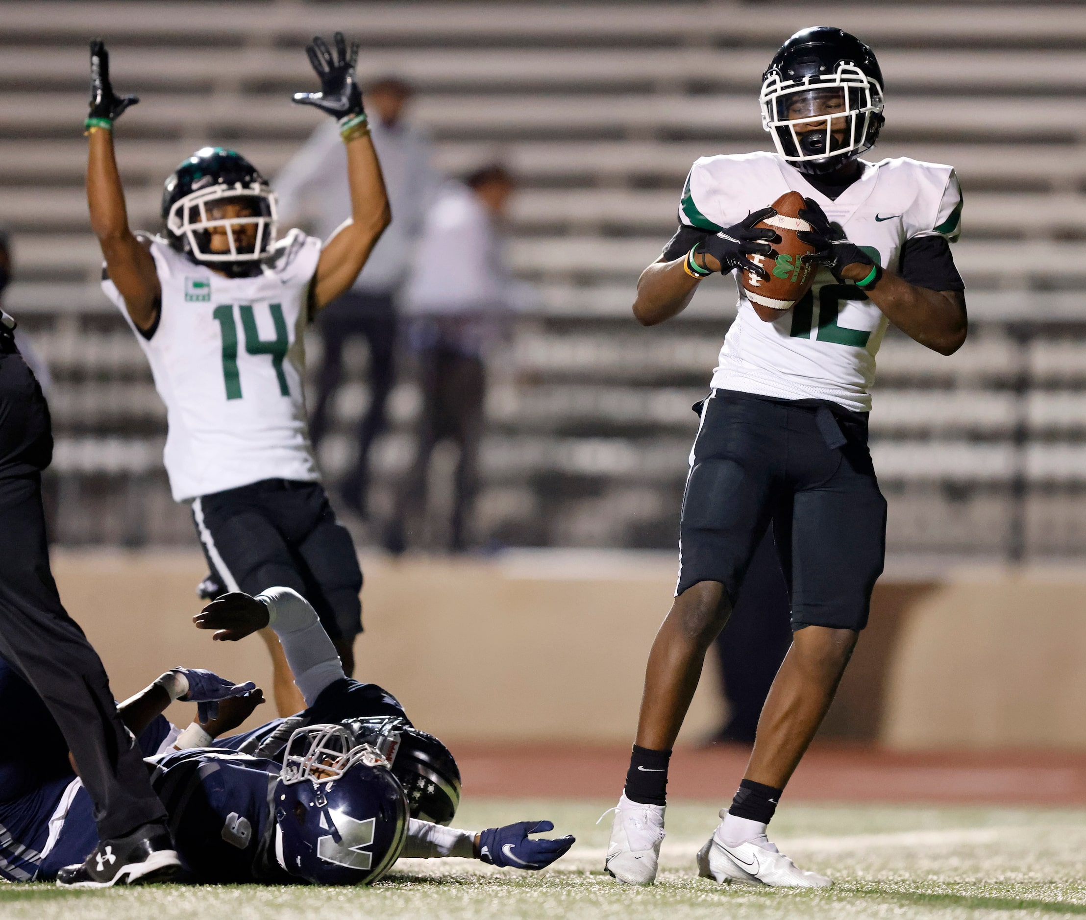 Richardson Berkner running back Jamary Williams (12, right)) scores the winning touchdown...