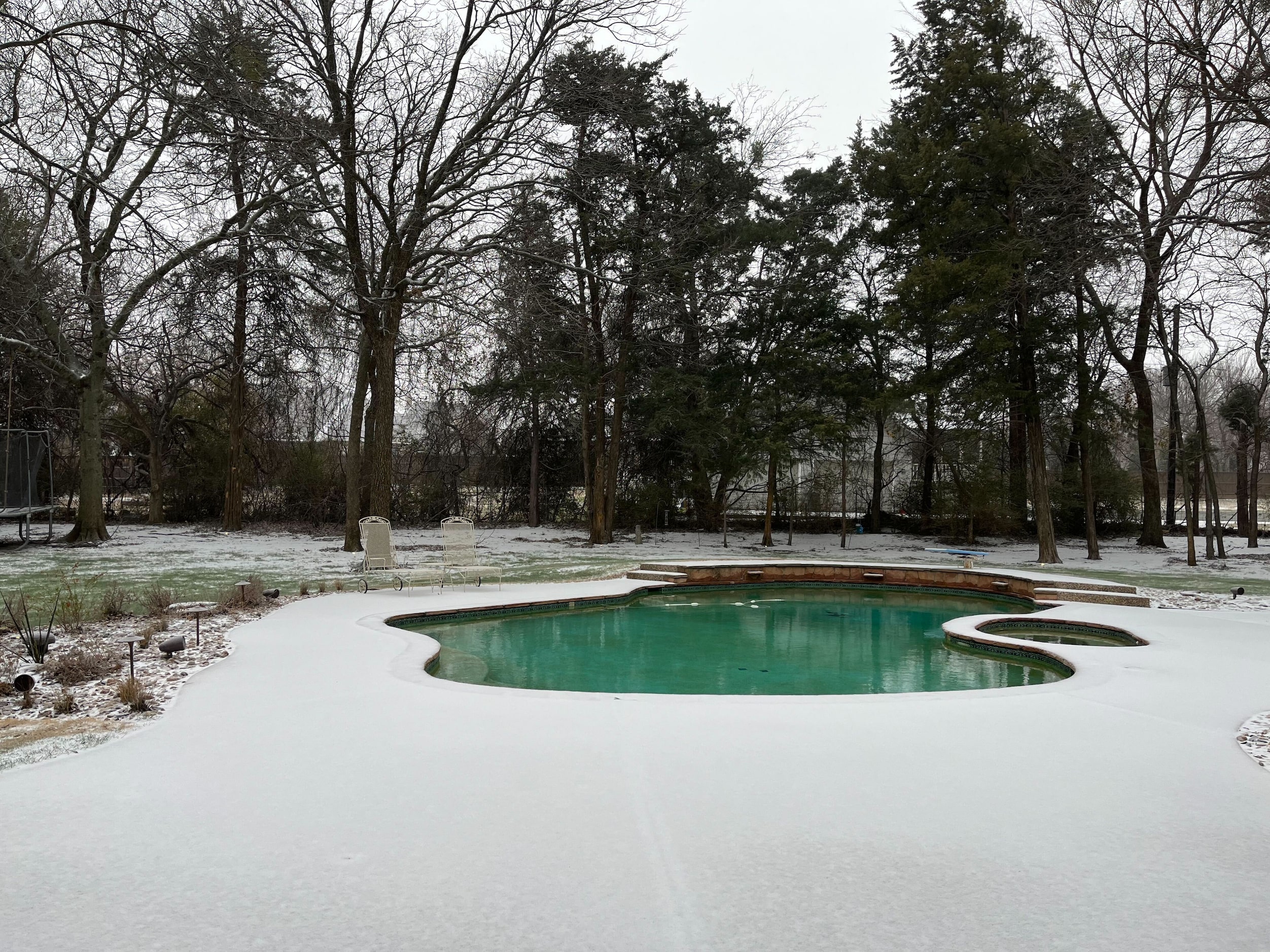 Frozen precipitation covers a backyard in Mansfield on Tuesday, Jan. 31, 2023. 