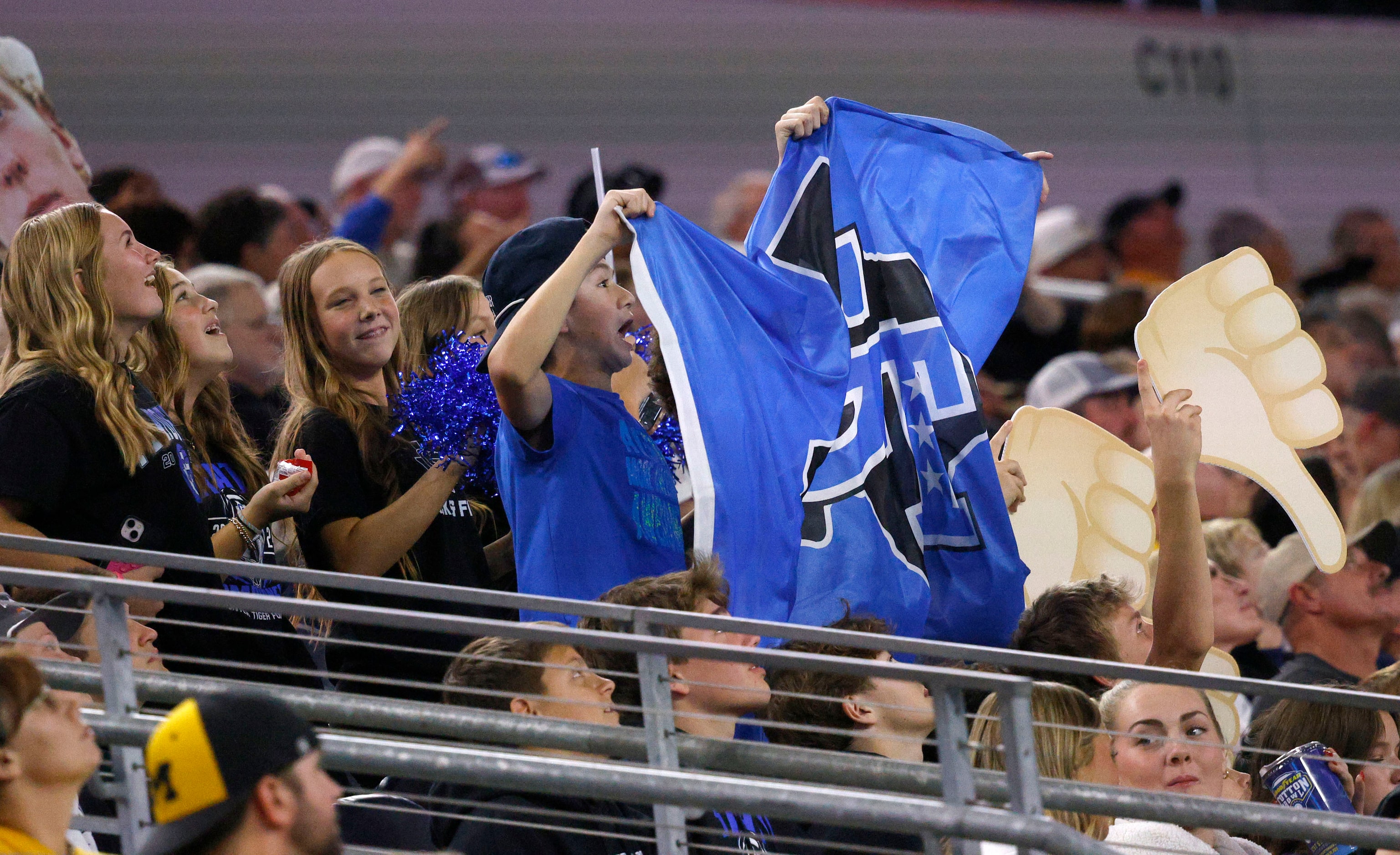 Fans cheer in the second half of the Class 3A Division II, UIL State Championship game...