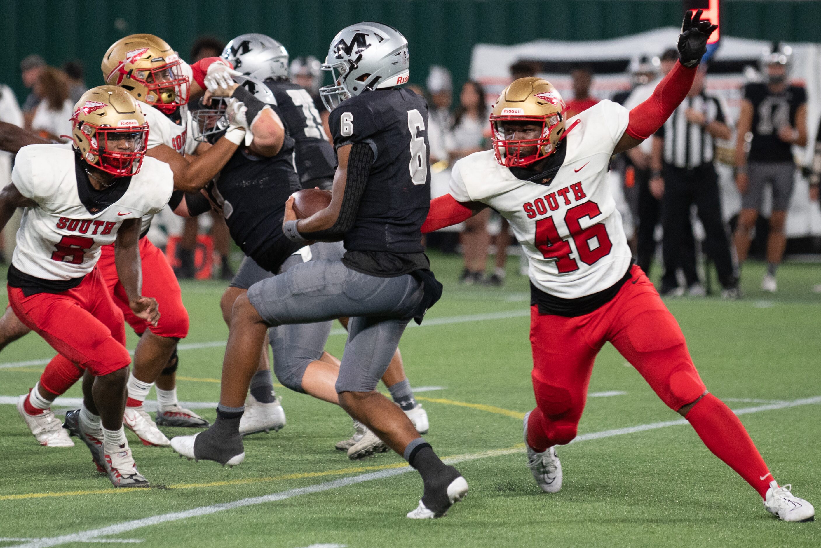 South Grand Prairie senior defensive end Keoni Perkins (46) rushes Arlington Martin junior...