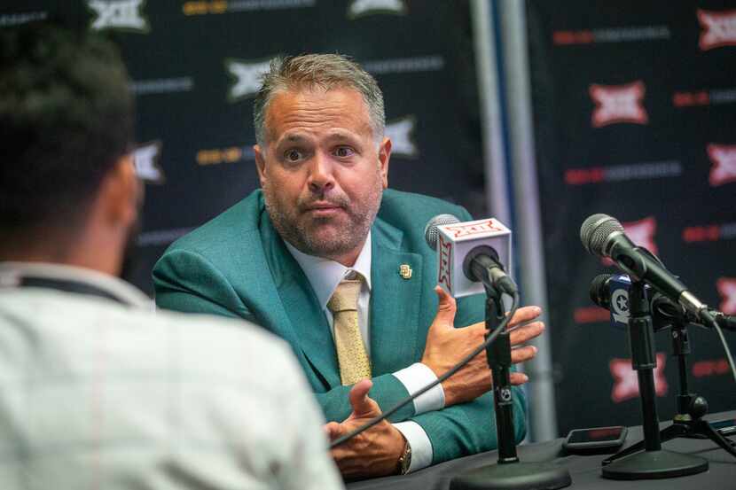 Baylor University head football coach Matt Rhule speaks with reporters during the breakout...