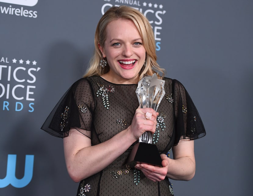 Elisabeth Moss, winner of the award for best actress in a drama series for "The Handmaid's...