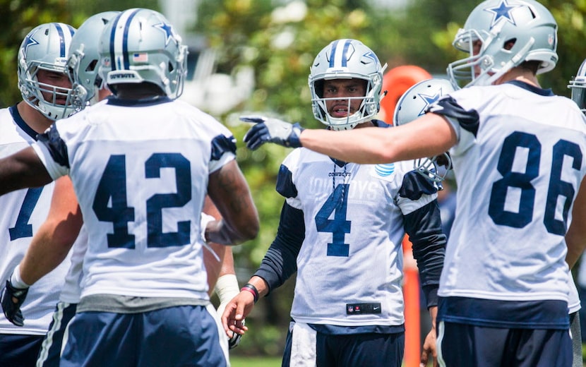 Dallas Cowboys quarterback Dak Prescott (4) calls a play during practice on Wednesday, June...