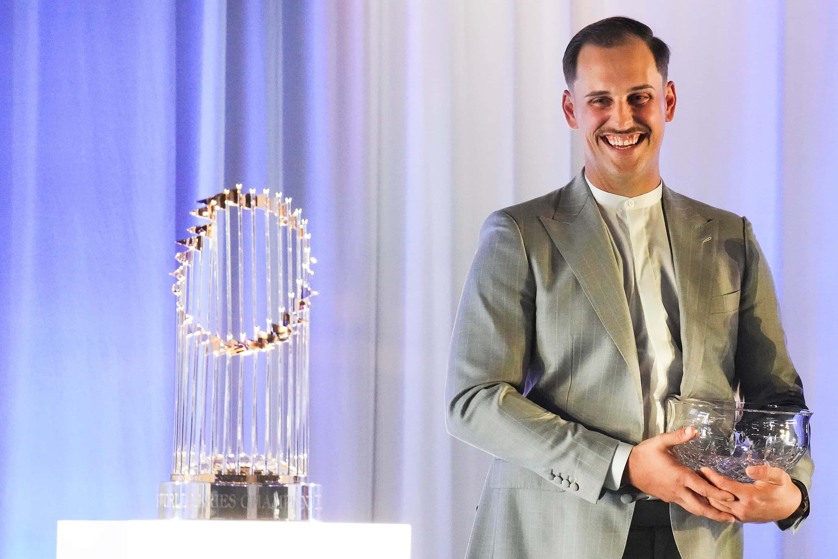 Texas Rangers first baseman Nathaniel Lowe is presented with the 2023 Harold McKinney Good...