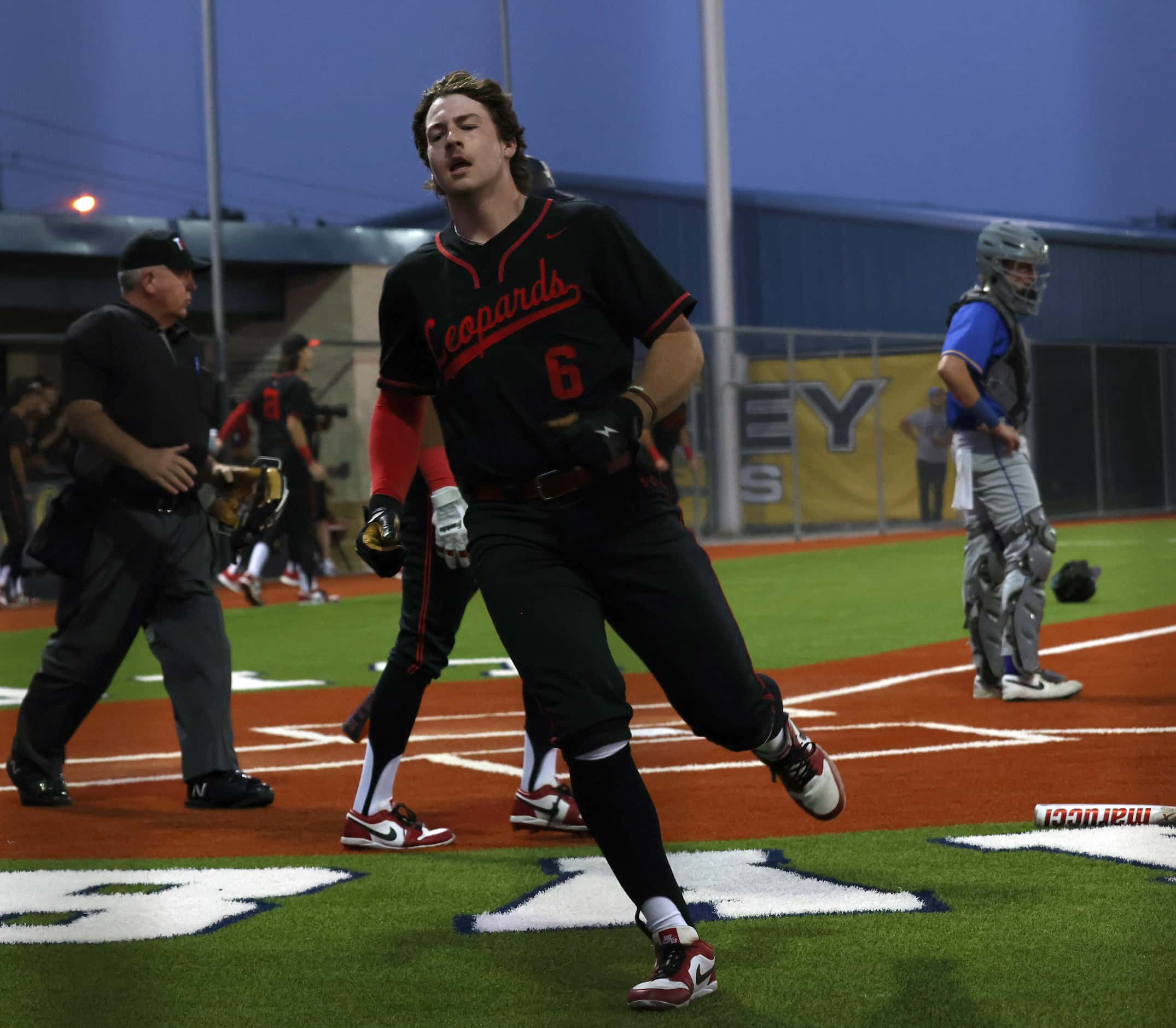 Lovejoy's Asher Lacy (6) scores during the bottom of the 3rd inning of play against Frisco....