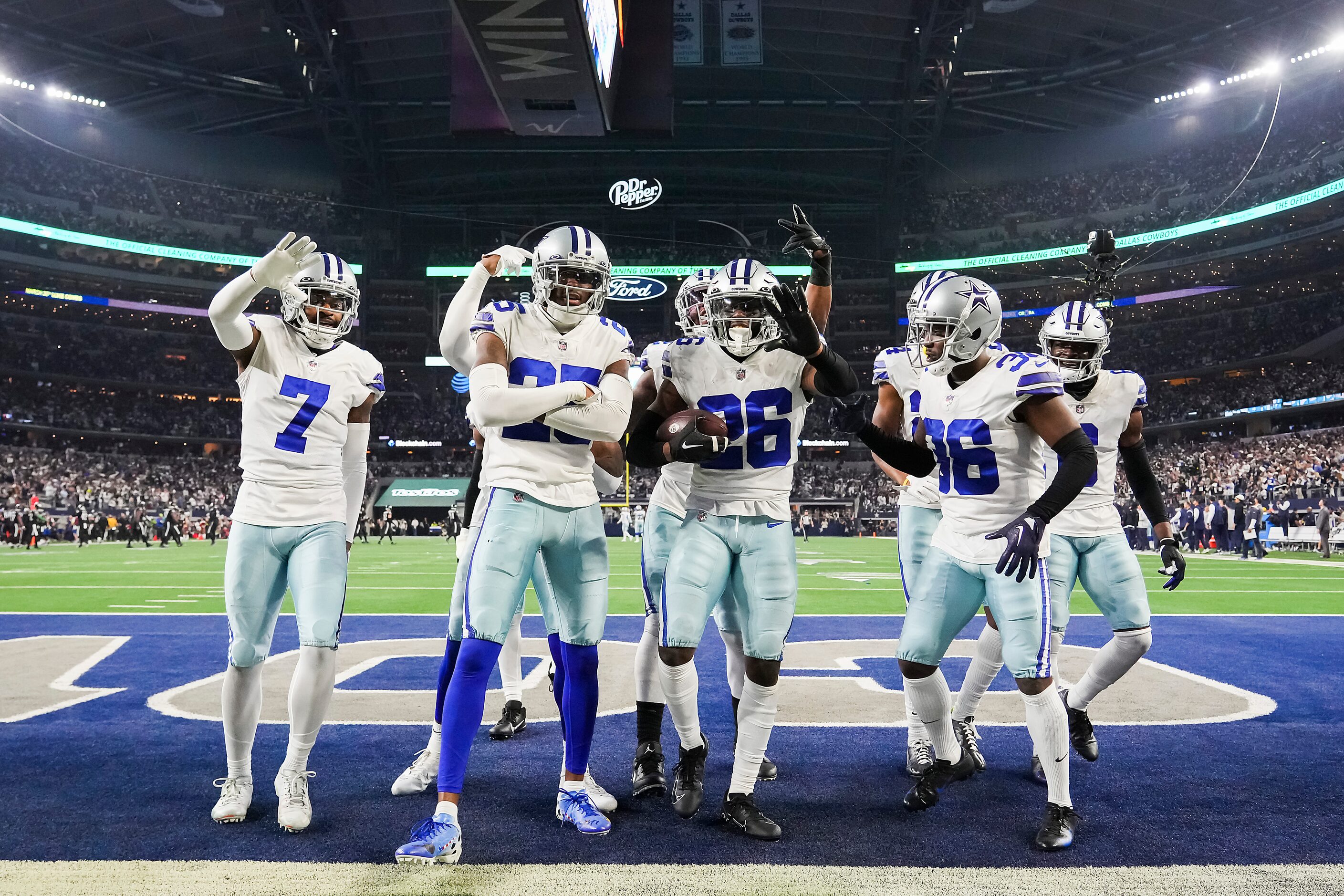 Dallas Cowboys cornerback DaRon Bland (26) celebrates with teammates after intercepting a...