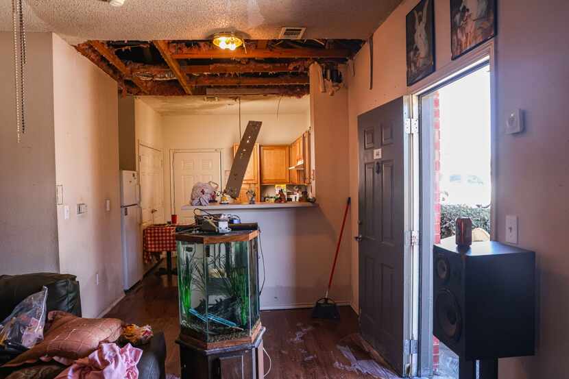 An apartment in Dallas where the kitchen ceiling collapsed due to water damage after...
