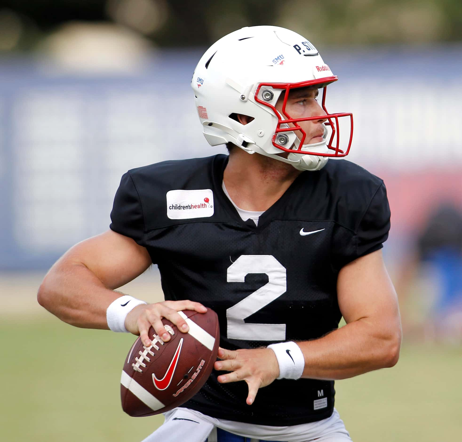 SMU Mustangs starting quarterback Preston Stone (2), looks to pass during a team practice...