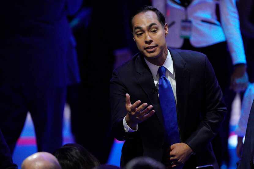 Democratic presidential candidate former Housing Secretary Julian Castro greets people...