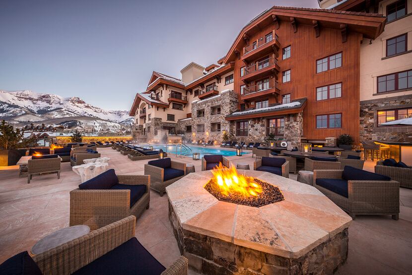 The Madeline Hotel offers fire pits, a pool, an ice rink and more as part of its ski-in,...