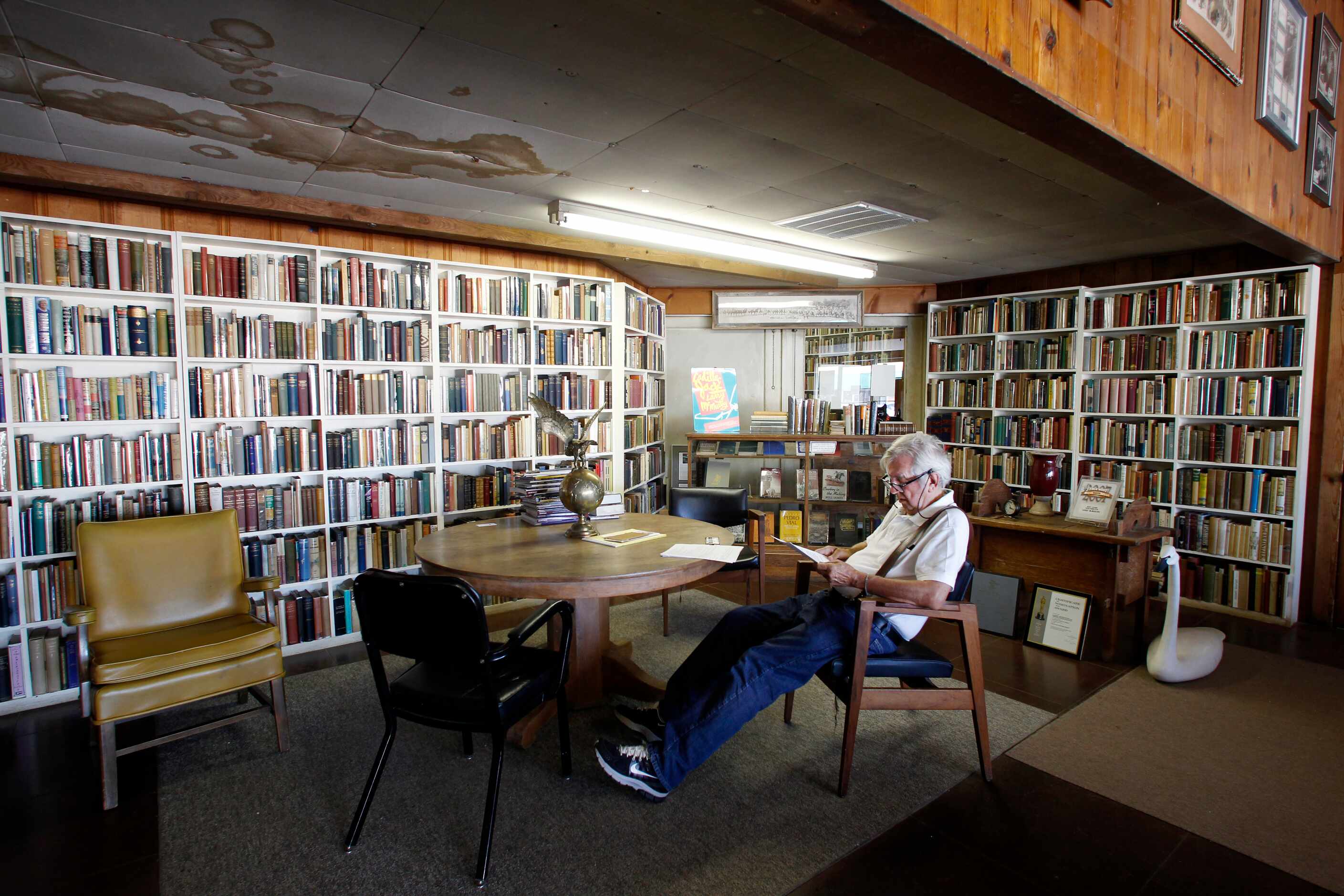 Pulitzer prize winning author Larry McMurtry relaxes and reads in Booked Up Inc. 1...