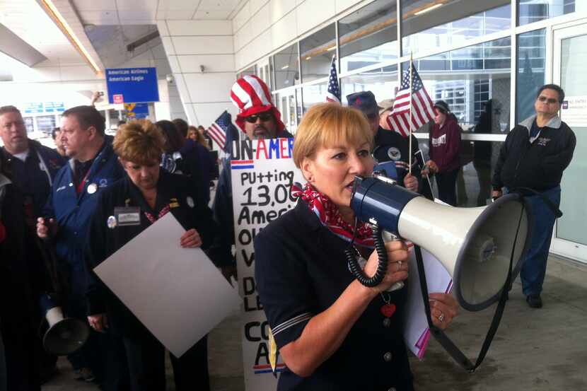 Lori Bassani, who heads the flight attendants union at American Airlines, led a protest in...