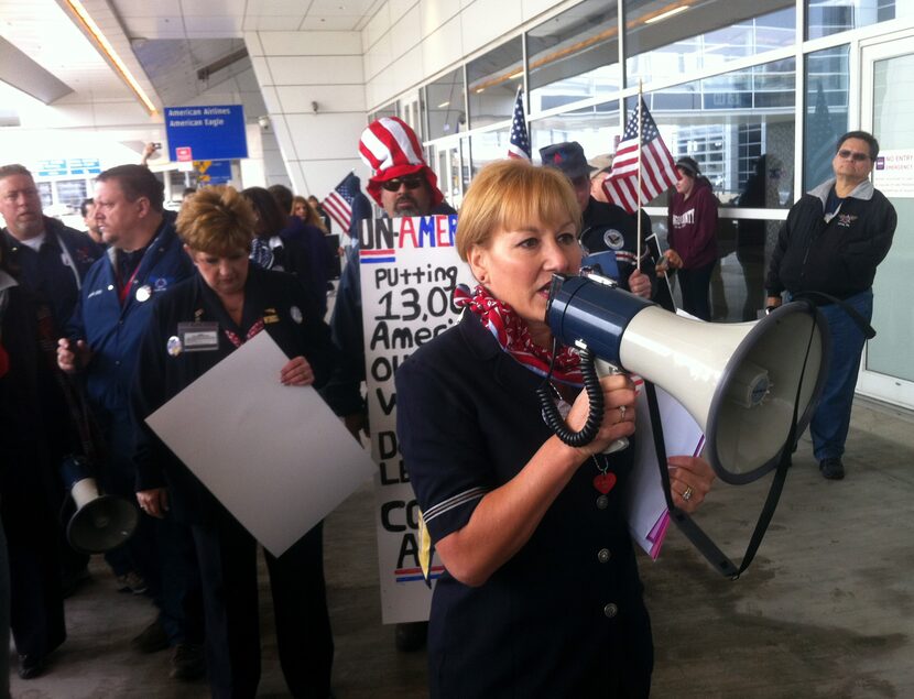 Lori Bassani, who heads the flight attendants union at American Airlines, led a protest in...