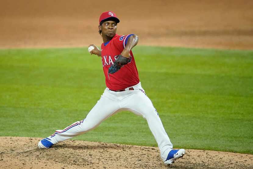 Texas Rangers pitcher Rafael Montero delivers during the ninth inning against the Los...